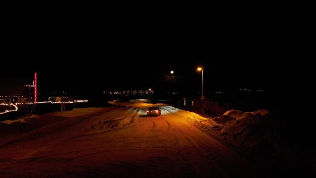 Car drifting in snow in Iceland