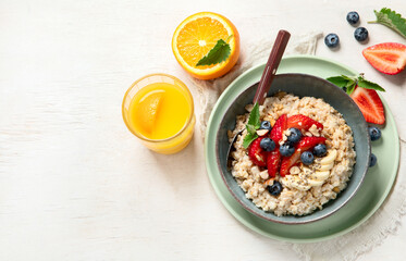 Healthy homemade oatmeal with berries for breakfast.