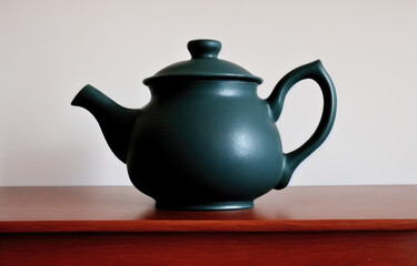 tetera de barro bebiendo té paisaje