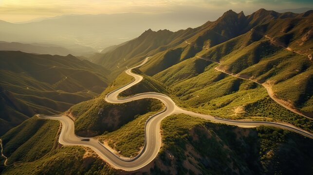 An awe-inspiring aerial view of a winding road cutting through mountains or a coastal landscape, depicting nature's grandeur. Generative AI