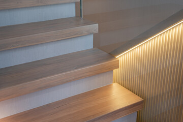 wooden modern stairs and glass railing