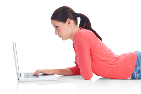 Laptop, profile and education with a woman student lying on the floor isolated on a transparent background. Computer, internet or research with a serious young female university pupil studying on PNG