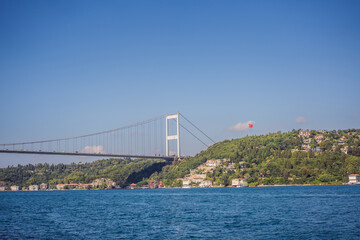 Turkey, Istanbul, houses below Fatih Sultan Mehmet Bridge on Bosphorus Strait