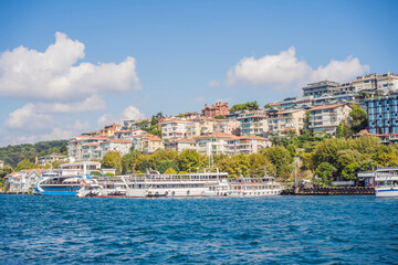 Naklejka premium Muslim architecture and water transport in Turkey - Beautiful View touristic landmarks from sea voyage on Bosphorus