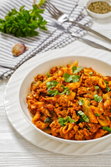 Ground Chicken Pasta Bake in white bowl, top view
