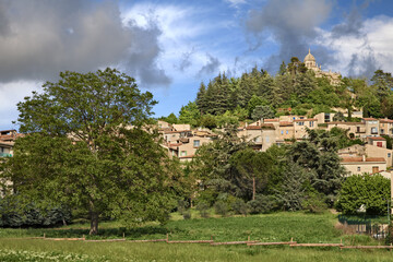 Forcalquier, Provence-Alpes-Cote d’Azur, France: landscape of the village with the ancient Citadelle on the hill