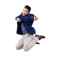 Portrait, pointing and a business man jumping isolated on transparent background in celebration of...