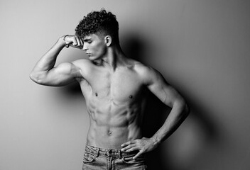 Fototapeta premium man fitness studio body athlete caucasian athletic muscle fit background healthy shirtless model