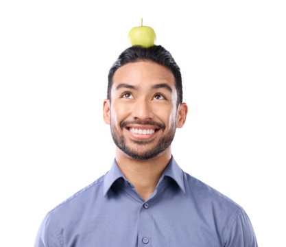 Happy man, apple on head and balance nutrition, health and fruit isolated on transparent png background. Lose weight, diet and male person smile for vegan life, benefits of healthy food and wellness
