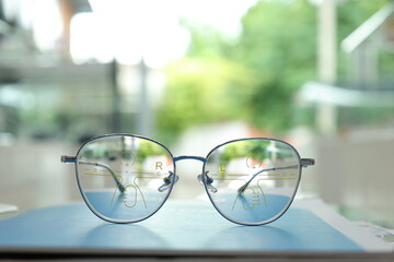 glasses on the street, Eyeglasses on table, progressive lenses, eyeglasses for the elderly, glasses...