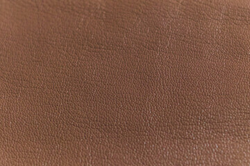 Fototapeta premium detailed view of a luxurious brown leather piece, highlighting the intricate patterns and natural feel. Timeless Elegance