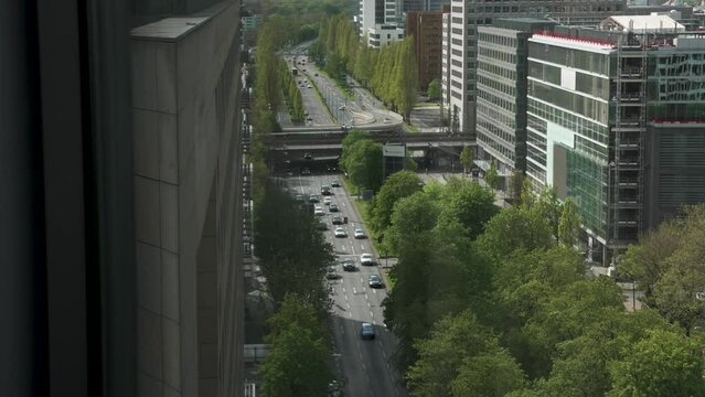High Angle Looking Down At Theodor-Heuss-Allee Road And Light Traffic. Slow Motion