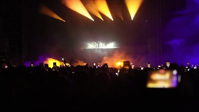 Beautiful golden lightshow on stage before artist performance