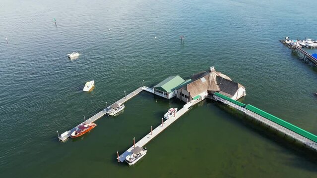 Coeur d' Alene, Idaho USA - June 07 2023: Aerial view of one of the most popular restaurants in the city, Cedars Floating Restaurant in Lake Coeur d' Alene.