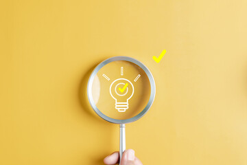 Quick tips for smart creative. light bulb and idea checking icon inside magnifier glass, working Creativity, Creative for new innovation with energy and power, growth and success development.. - obrazy, fototapety, plakaty