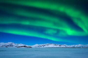 Landscape with northern lights over Iceland