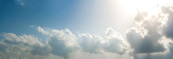 Blue sky with white clouds in the background. Panorama