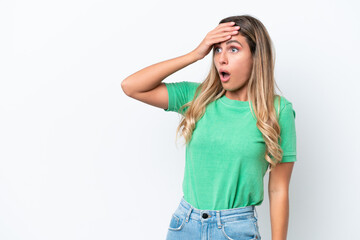 Fototapeta premium Young Uruguayan woman isolated on white background with surprise expression while looking side
