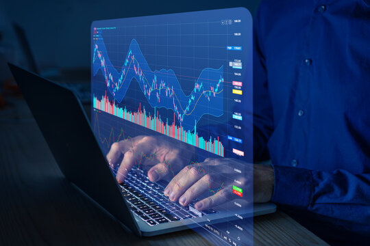 Stock exchange trading data and financial investment. Person using online trading interface with charts and statistics on computer screen to analyze ETF and ticker price evolution. Sell or buy.
