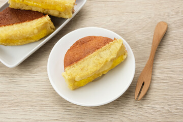 Kue Pukis with pineapple jam, made from flour, yeast, egg, sugar and then baked. Indonesian traditional food
