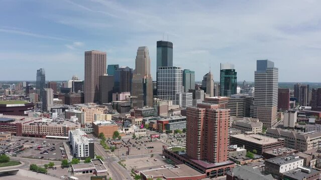Rising aerial panning shot of downtown Minneapolis, Minnesota. 4K