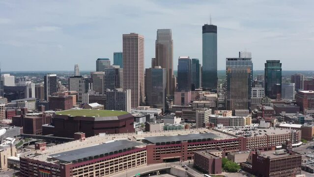 Close-up dolly aerial shot of the downtown Minneapolis skyline in Minnesota. 4K