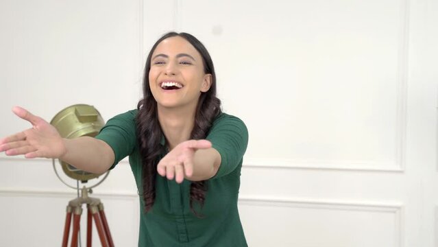 Indian woman giving flying kisses