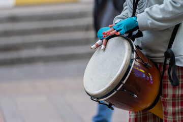 Street musician playing the drum