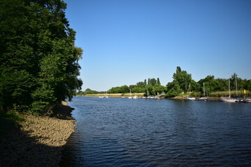 boats on the river on a sunny day