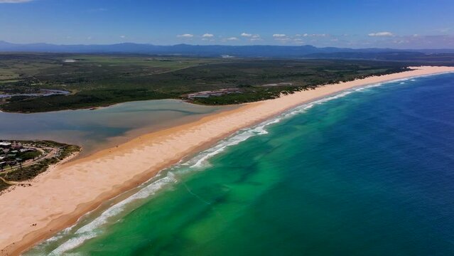 South Africa Gamtoos Mouth Long Beach JBAY Jeffreys Bay aerial drone town homesmost stunning white sand epic surf wave saturated aqua blue rugged reef coastline daytime Supers Boneyard summer circling