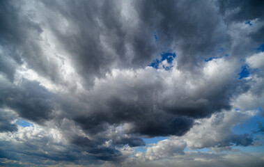 storm sky, dark dramatic clouds during thunderstorm, rain and wind, extreme weather, abstract...