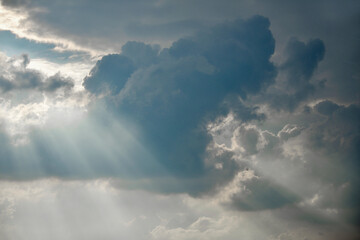 Scattered cloud clusters in a blue sky, blue sky background with white clouds.