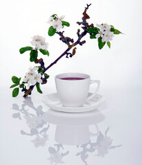 cup of tea and flowers