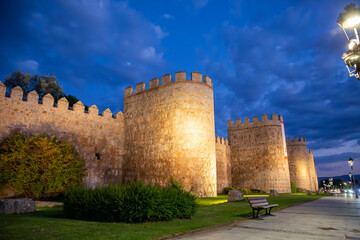 Fototapeta na wymiar Night view of the west wall of the city of Avila, Spain