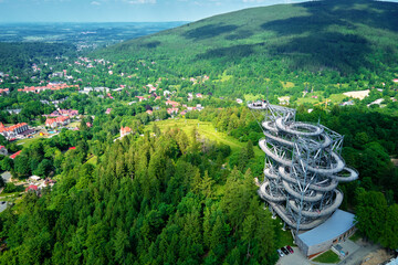 Sky Walk observation tower in Sweradow Zdroj, Poland. Tourist attraction in montains, aerial view....