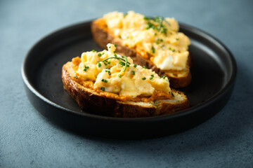 Homemade scrambled eggs on toast