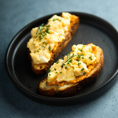 Homemade scrambled eggs on toast