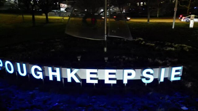 Aerial Night Pan Shot of the Poughkeepsie New York Sign