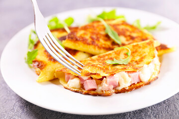 fried crepe with ham and cream