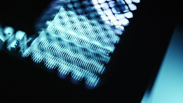 Subtly lit Gaming PC seen through mesh