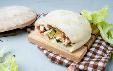 Kebab in Piet, shavarma with kuritsei in Piet in light background.