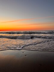 Orange sea coast, twilights at the sea, sandy coastline, natural evening seascape background