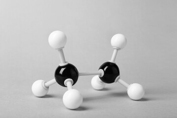 Molecule of alcohol on light grey background. Chemical model