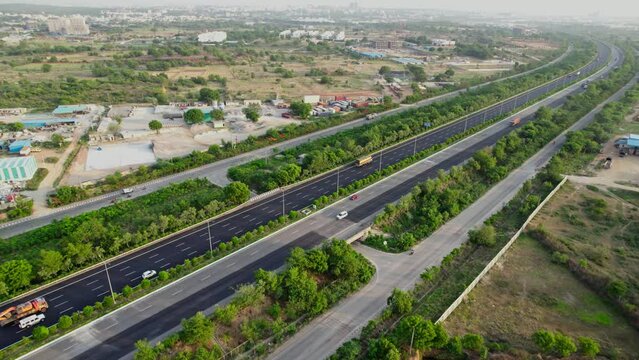 hyderabad orr express highway with vehicles wide areal drone shot 4k 30p