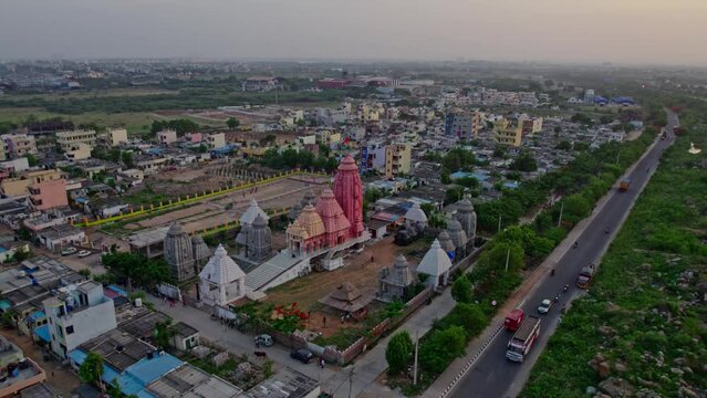 jain temple during sunset near outer ring road in hyderabad areal drone shot 4k 30p