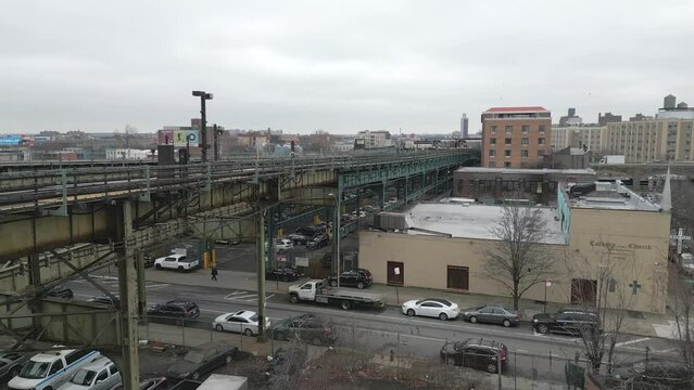 View of an Elevated Subway Train Structure Over a Street in Brooklyn - Pt. 1