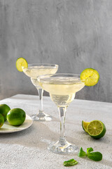 Margarita cocktail with lime and mint. Classic Margarita or Daiquiry Cocktail. Refreshing summer cocktail