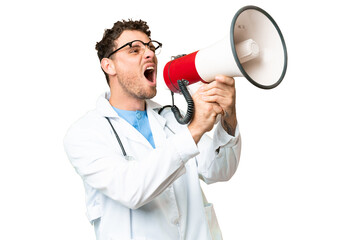 Brazilian doctor man over isolated chroma key background shouting through a megaphone