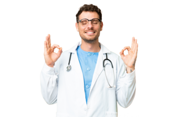 Brazilian doctor man over isolated chroma key background in zen pose