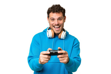 Brazilian man playing with a video game controller over isolated chroma key background